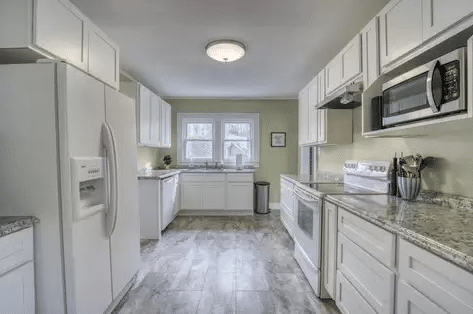 How to Create a Cohesive Interior Design With Flooring, Cabinets, and Stair Features