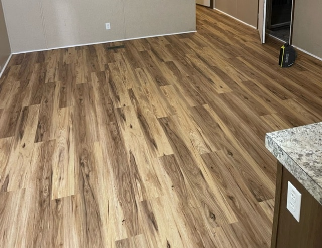 The Complete Flooring Maintenance Guide: Keeping Hardwood, Tile, and LVP Looking Their Best